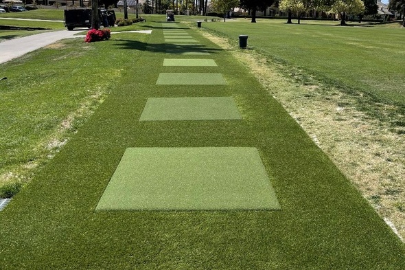 Toronto Outdoor tee line with light green synthetic grass boxes inside a dark green synthetic grass strip